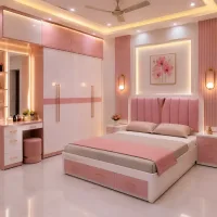 Pink and white bedroom with a blush upholstered bed, built-in wardrobe, matching vanity, gold accents, and warm LED lighting.