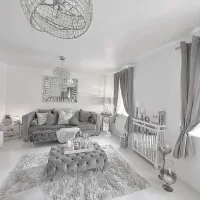 Elegant gray tufted sofa with layered pillows, a tufted ottoman, crystal chandeliers, and soft gray curtains in a neutral living room.