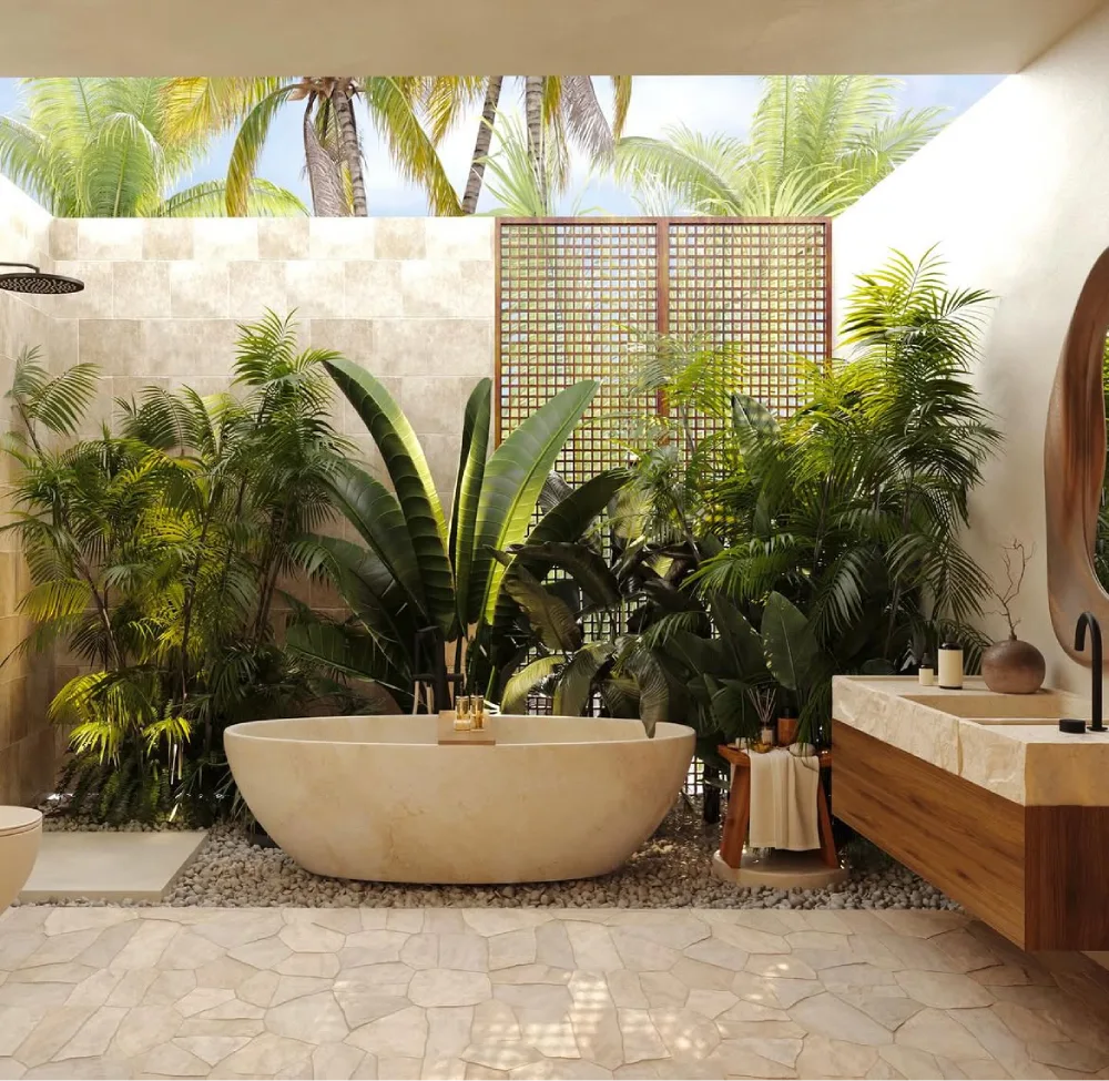 open-air bathroom with freestanding bathtub, tropical plants, stone floor, and wood vanity