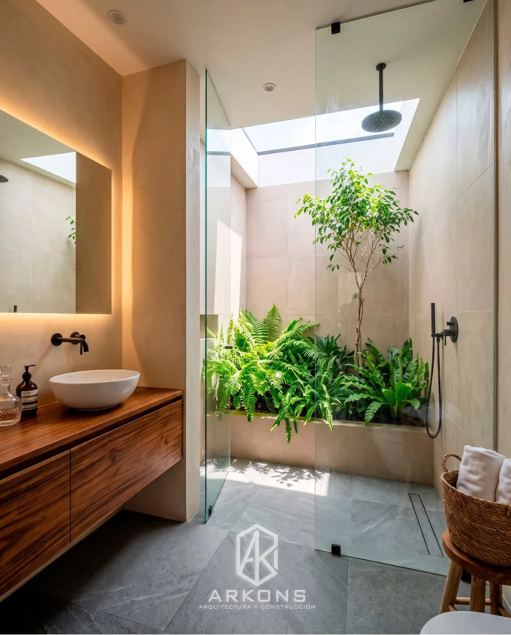 modern bathroom with glass shower, skylight, tropical plants, and warm wood vanity