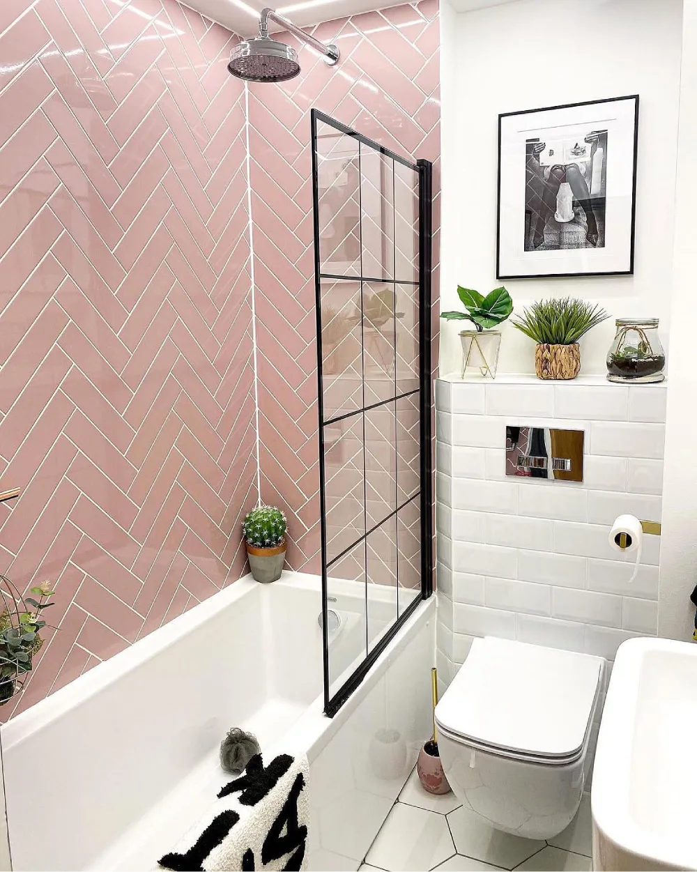 Modern bathroom with a trailing plant displayed on a wall shelf