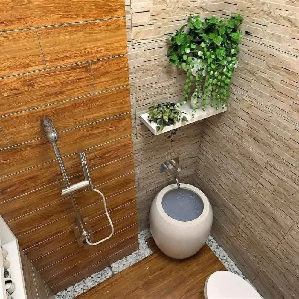 Small wood-look bathroom with a trailing plant on a wall shelf