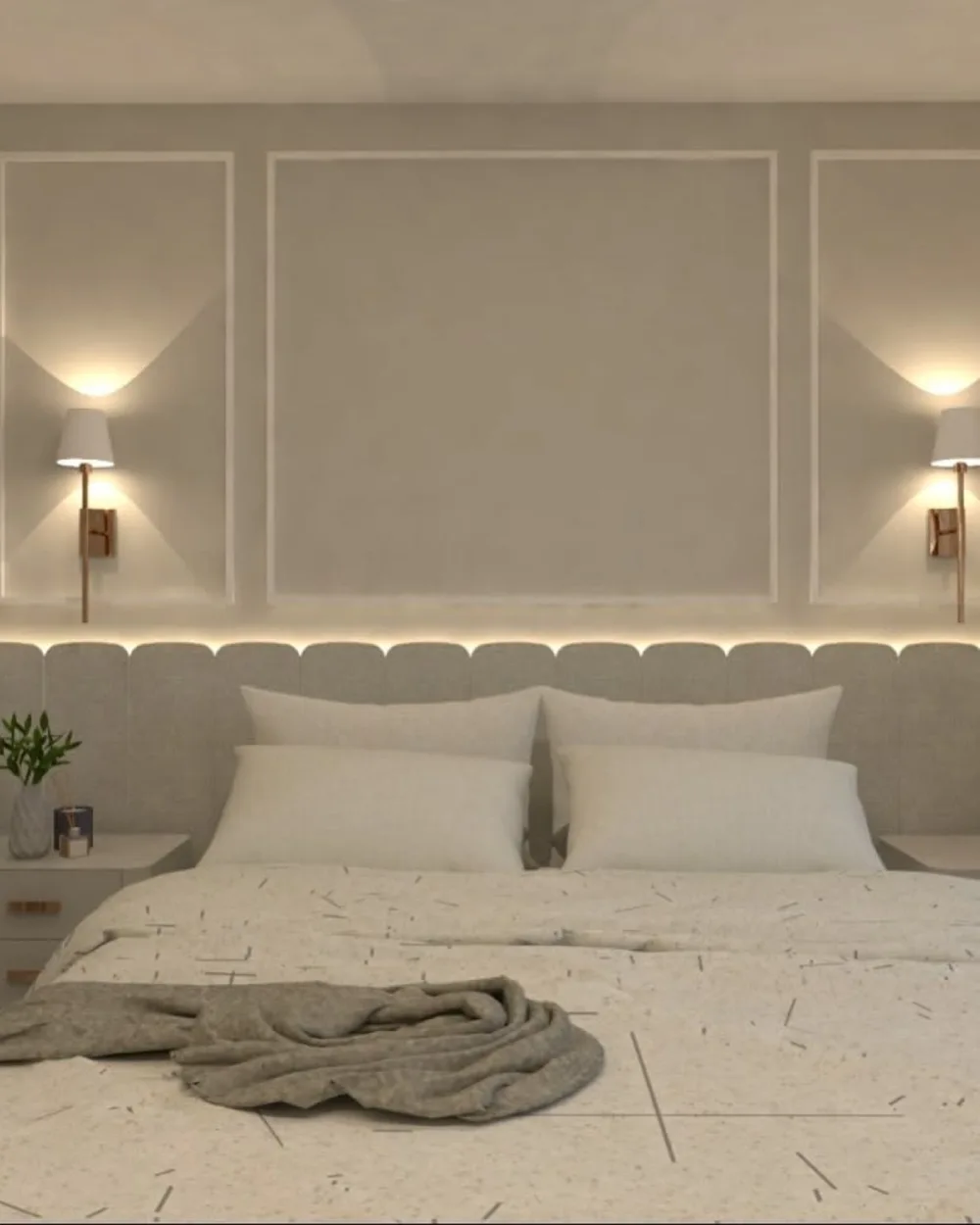 Warm neutral bedroom with beige wall molding, an upholstered headboard, soft white bedding, and modern brass wall sconces