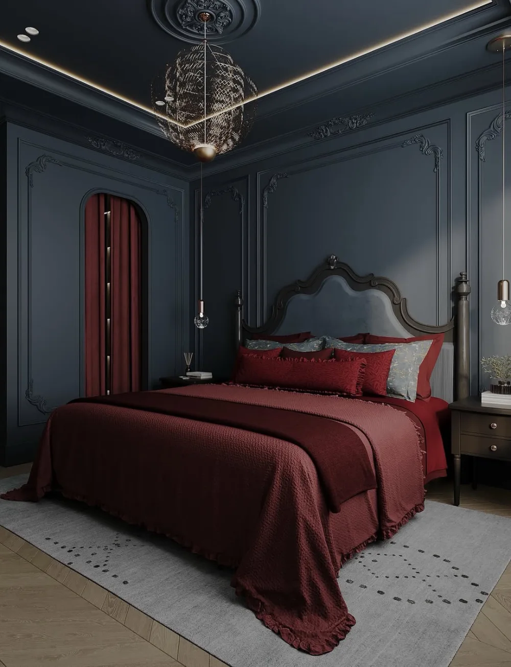 Elegant bedroom with navy blue paneled walls, burgundy bedding, an ornate upholstered headboard, and a decorative chandelier