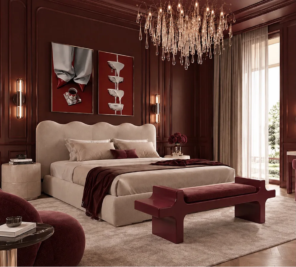 Luxury bedroom with dark burgundy wood paneling, a cream upholstered bed, burgundy accent bench, crystal chandelier, and warm neutral bedding