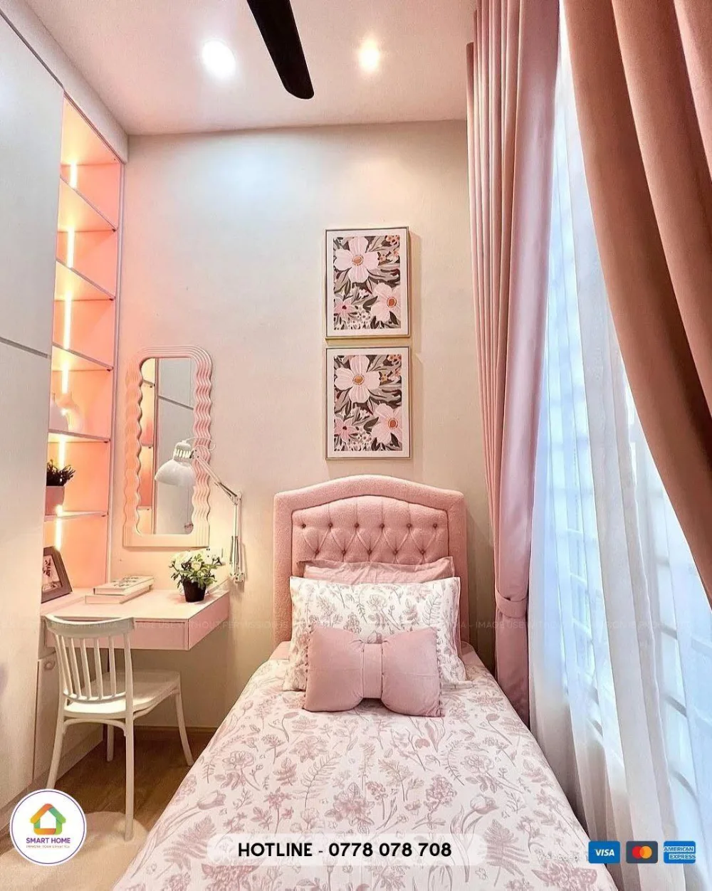 Small pink bedroom with a single bed and compact desk