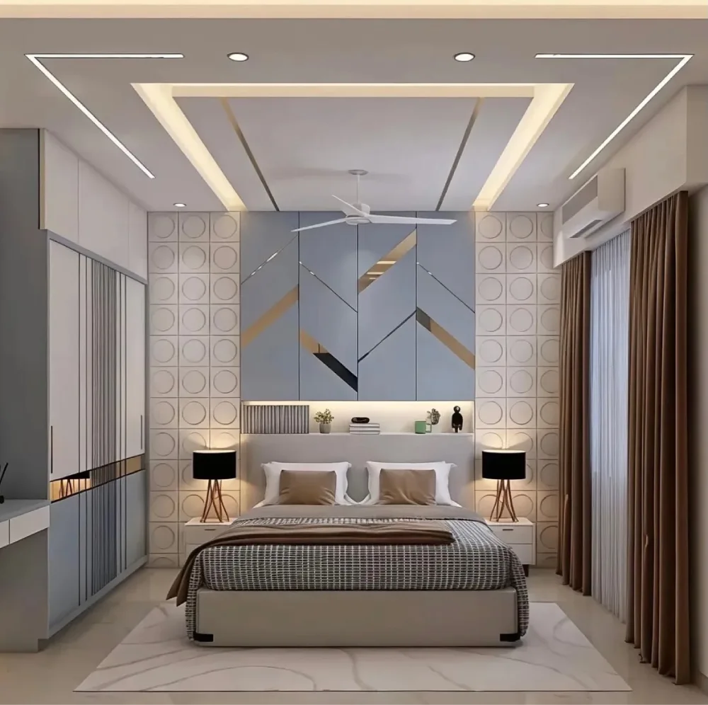 Modern bedroom with a gray geometric accent wall, gold decorative inlays, circular wall panels, a neutral upholstered bed, and warm recessed ceiling lighting.