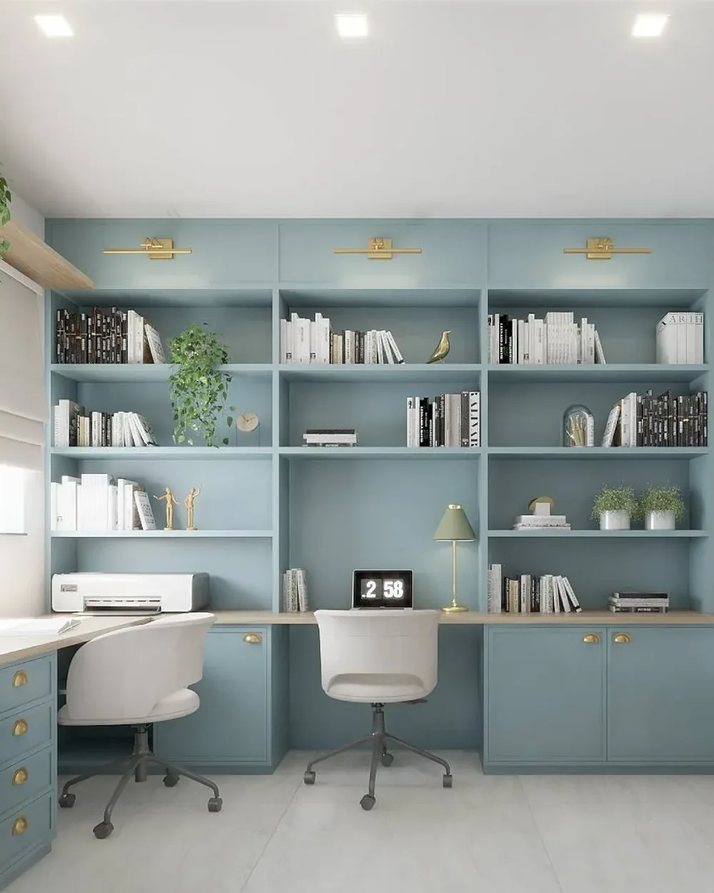 blue built-in bookshelf with a home office desk and books