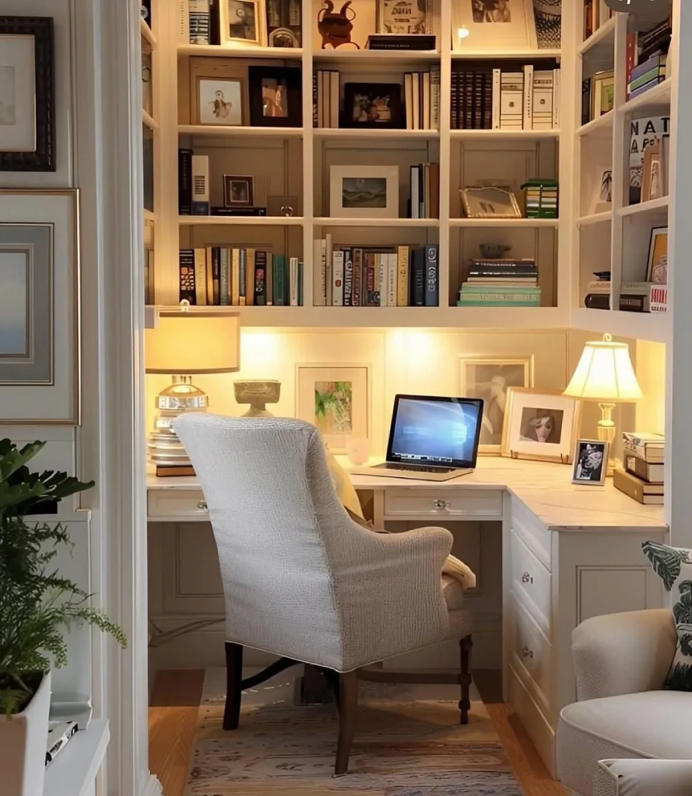 cozy built-in bookshelf and desk nook with warm lighting and books