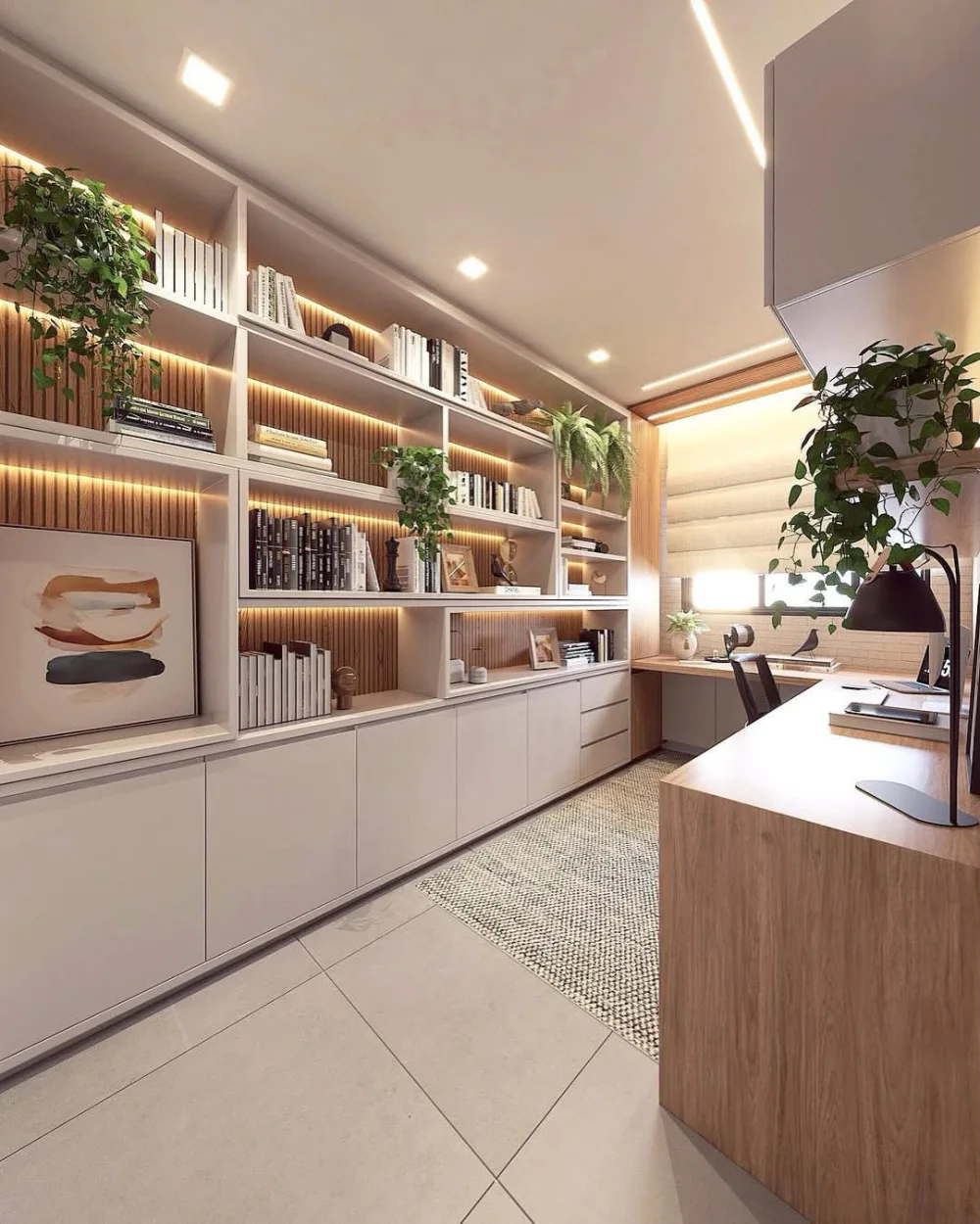 white home office bookshelf with wood accents, books, and built-in desk