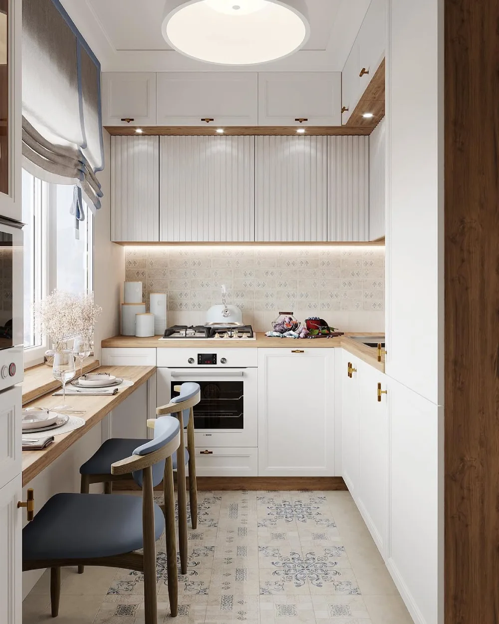Small white kitchen with a wood breakfast counter and compact dining nook