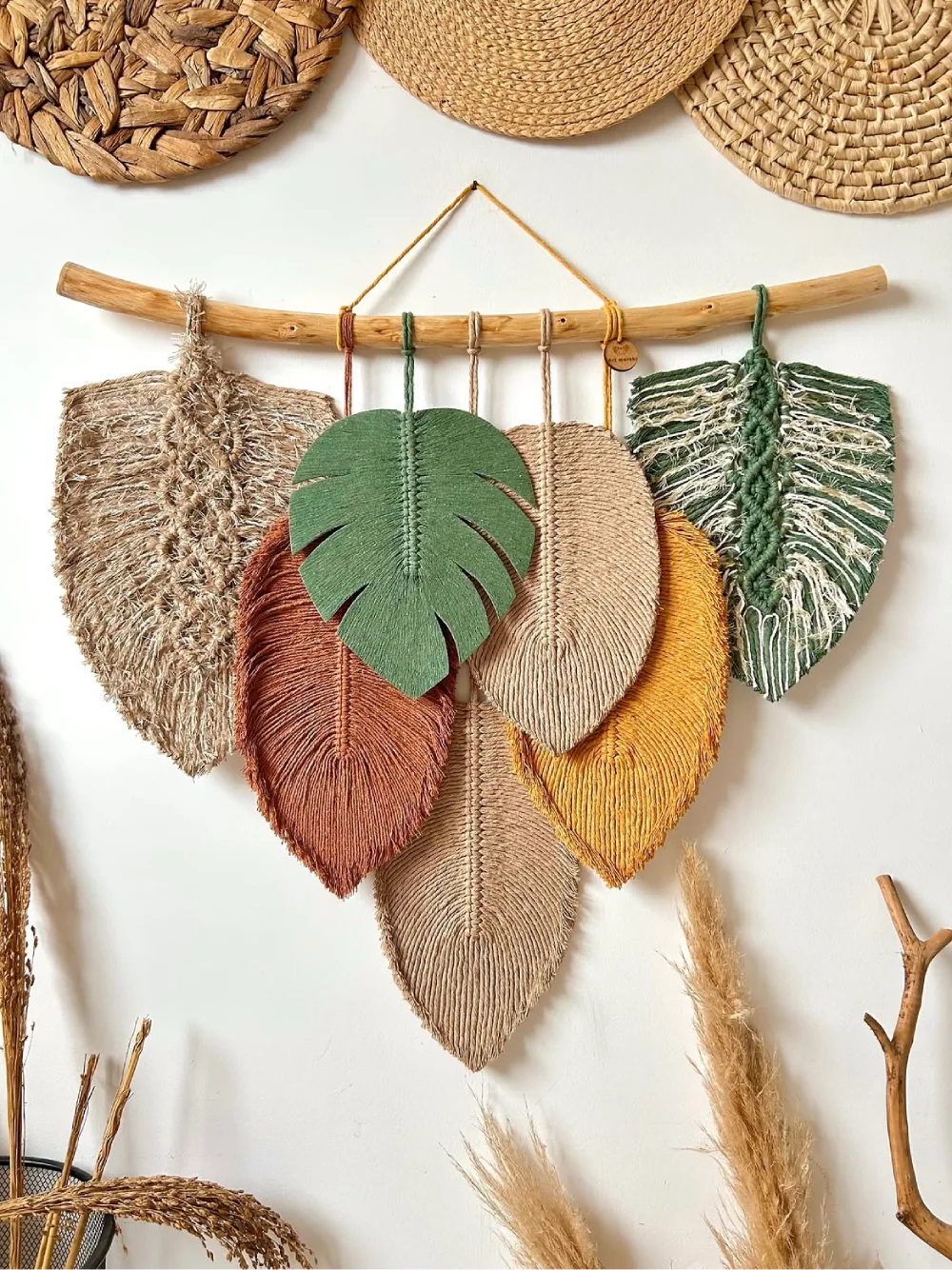 Macramé leaf wall hanging with woven natural fibers