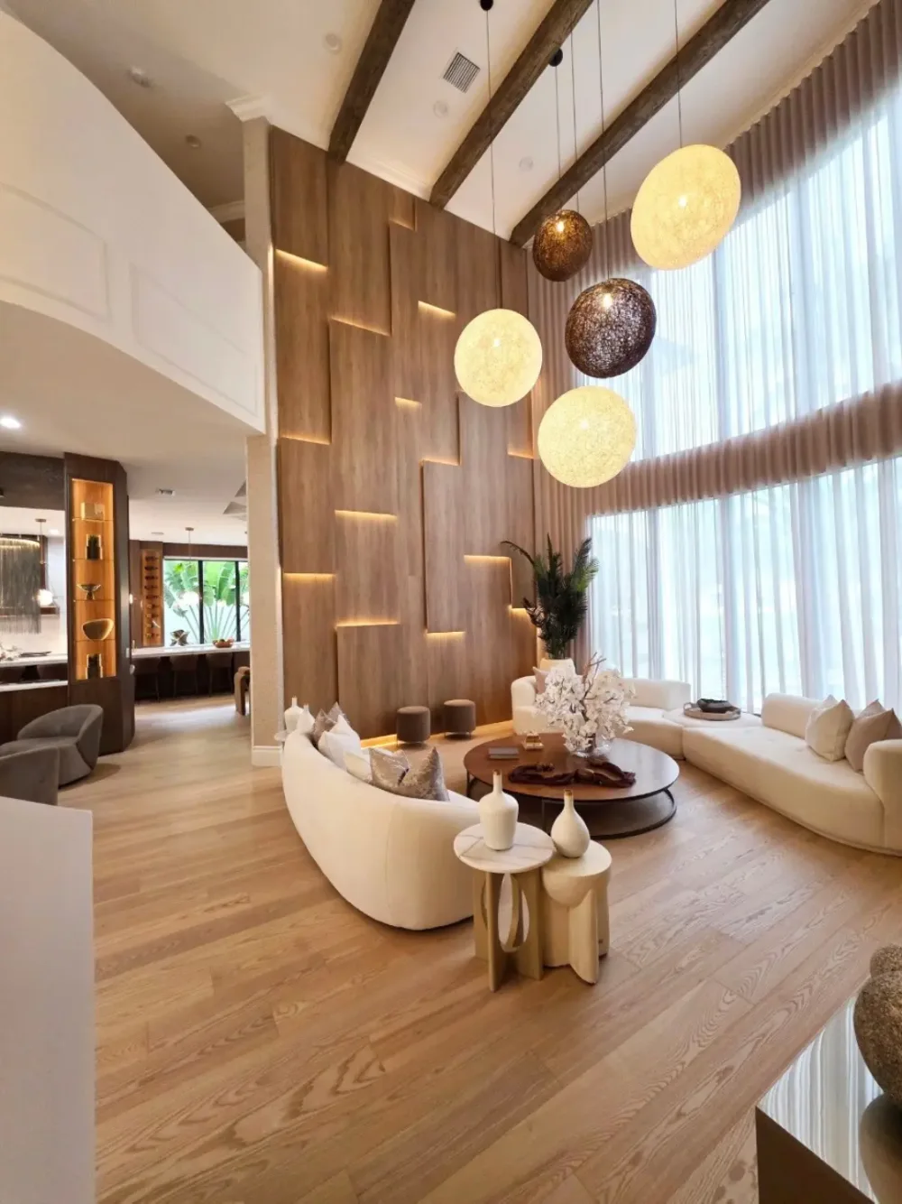 Modern living room with warm wood-paneled feature wall
