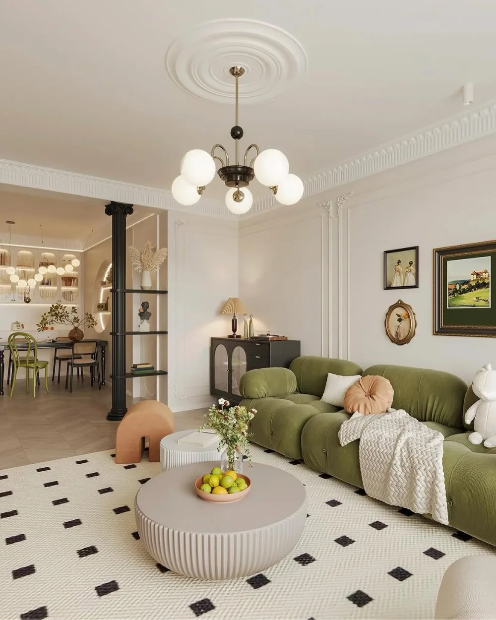 Curved olive green sectional with a round coffee table in an elegant living room