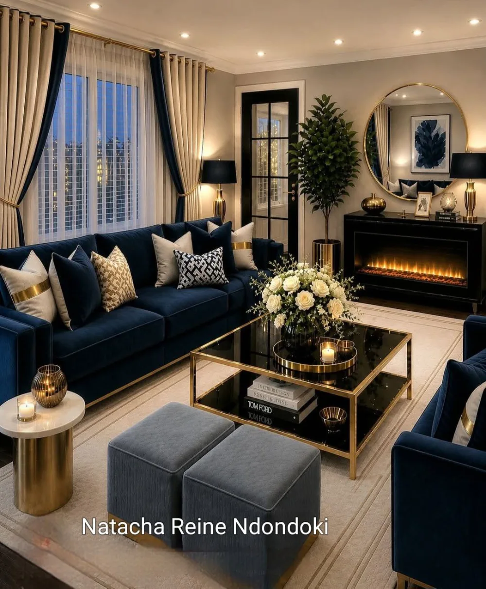 Navy blue luxury living room with velvet sofas, gold accents, fireplace, and elegant curtains