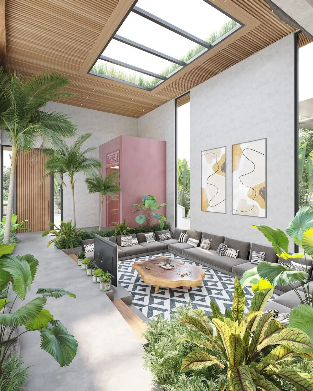 Sunken living room surrounded by tropical plants beneath a skylight