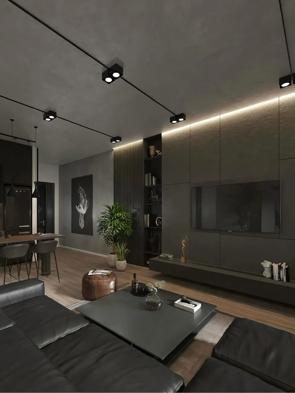 Minimalist moody living room with charcoal paneled walls, black leather seating, built-in television storage, and subtle LED lighting