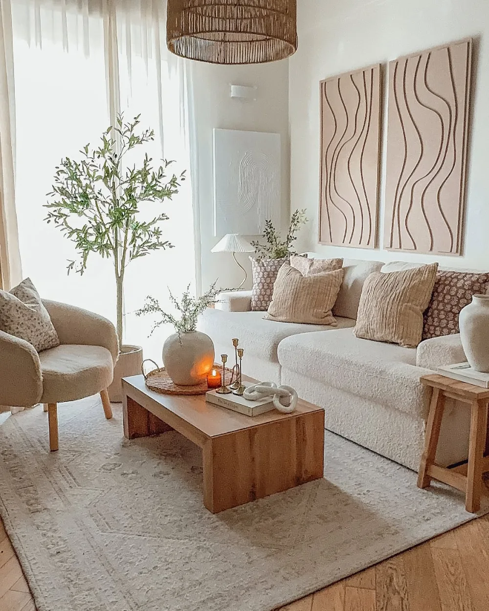 Small living room with a white brick TV wall, floating shelves, and built-in storage