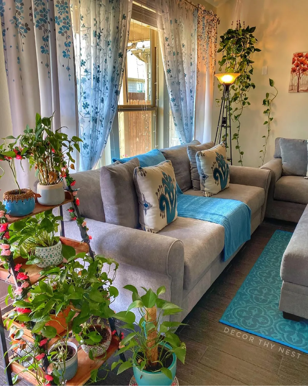 colorful living room filled with potted plants around the seating area