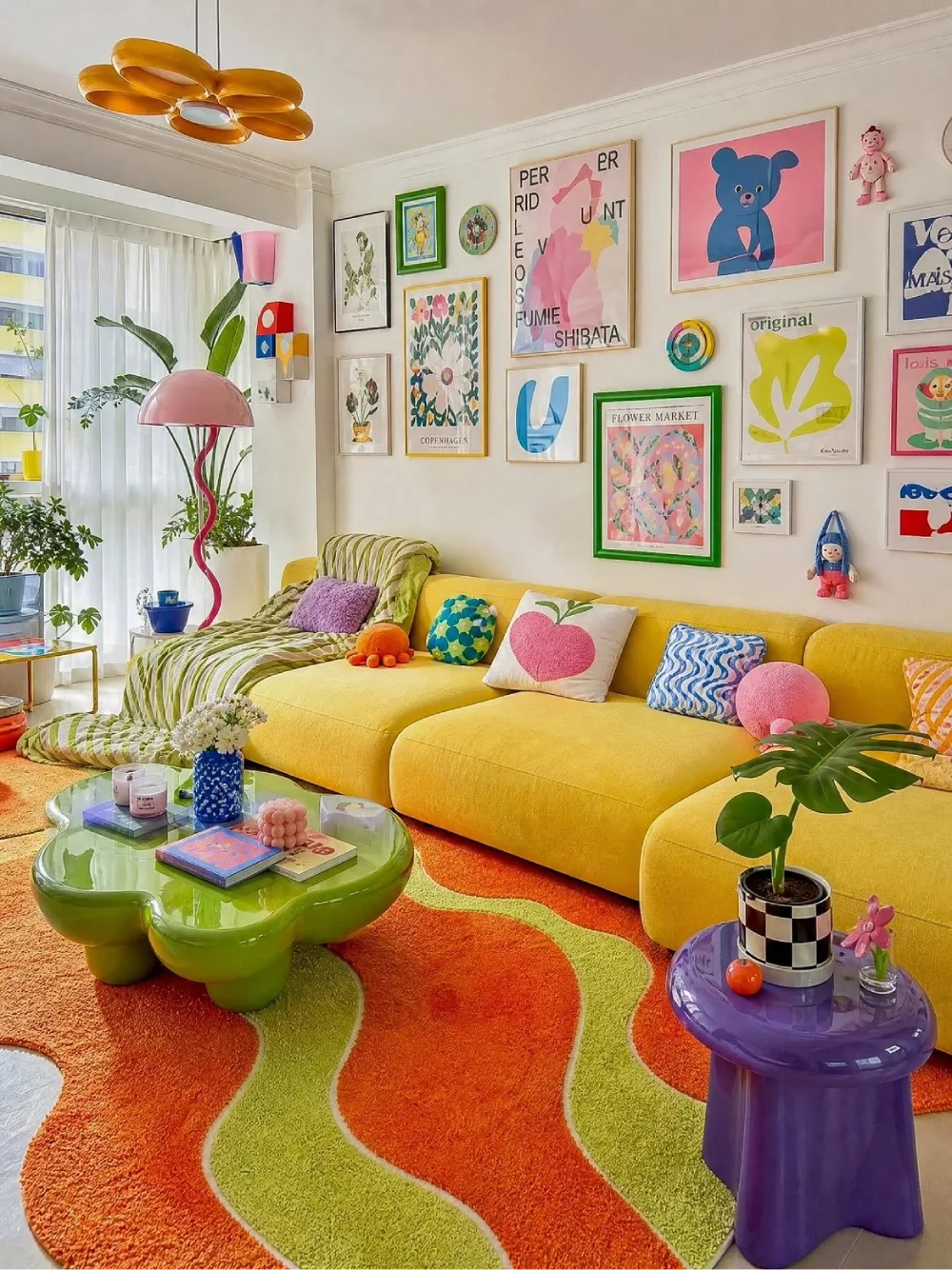Playful living room with yellow sectional, colorful gallery wall, and bold patterned rug