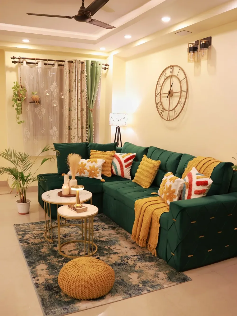 Dark green sectional sofa with mustard pillows and warm living room accents